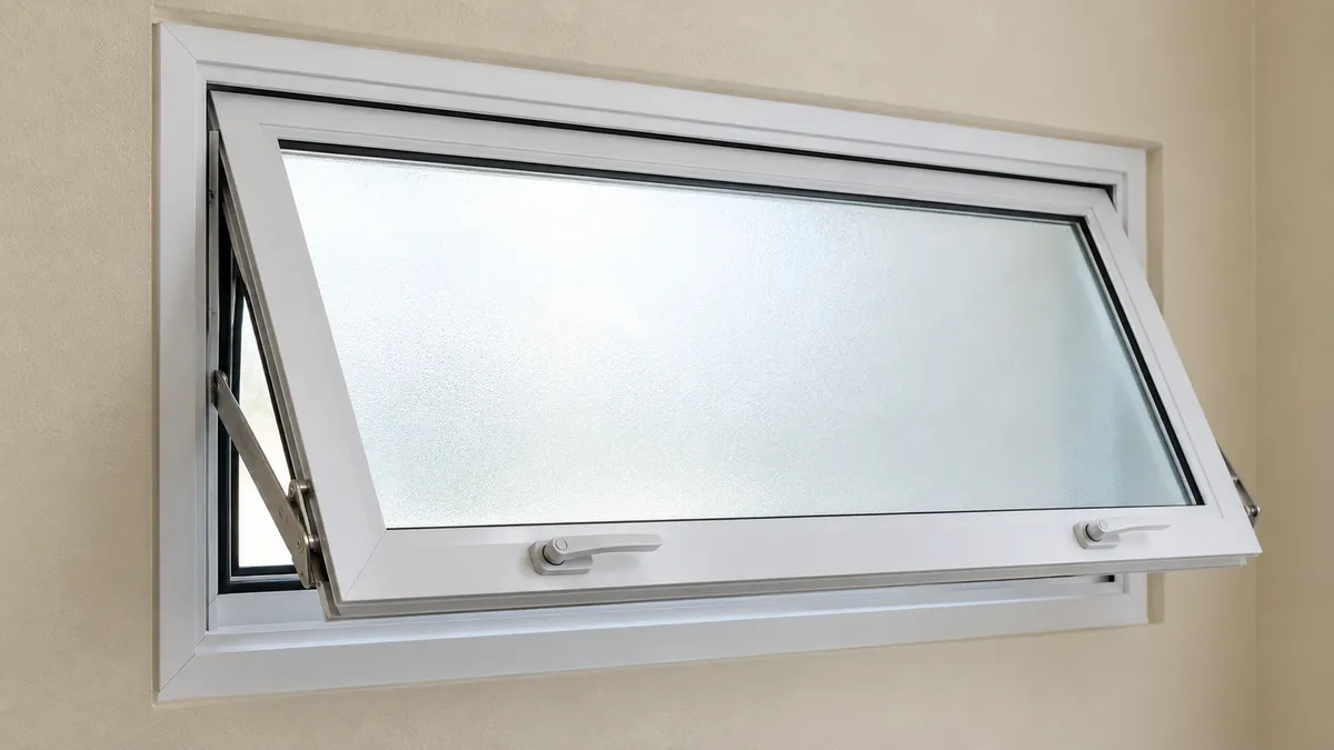 White aluminium awning window, top-hung and open